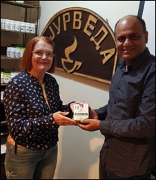 Dr. Vikram Chauhan Presenting Arjun Tea to Ms Divna Shipovikj at Planet Ayurveda Centre, Macedonia